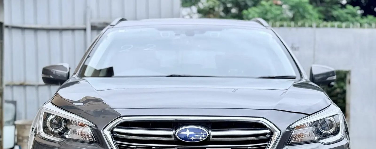 A car in the Motobacs yard, Hurlingham